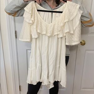 - Free People Elegant Cream Ruffle romper